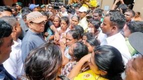 President visits flood victims