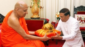President pays homage to Temple of the Sacred Tooth Relic