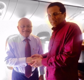 Gayoon, Maithripala meets on board a Dubai bound flight