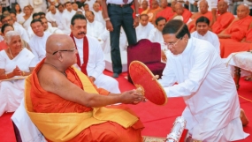 President participates in ceremony to offer Sannas Pathraya to new Anu Nayaka Thero