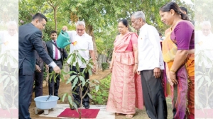 PRESIDENT PLANTS MANGO SAPLING TO MARK INDIA VISIT