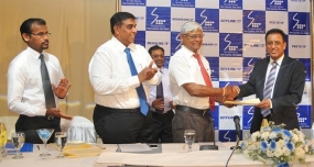 SLT inks USD 415mn ICT Investment Agreement with BOI