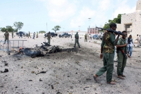 Suicide car bombing kills at least 6 near Somali parliament