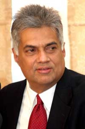 A deal between Abbot and Rajapaksa Government ? - PM