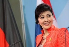 Thai ex-PM Yingluck pleads not guilty as trial opens
