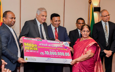 President Awards Prizes to NLB Lottery Winners