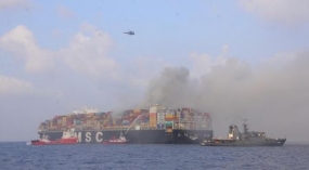 Navy assists to douse fire on container vessel