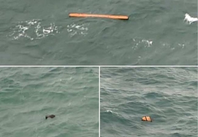 AirAsia plane wreckage found, bodies being recovered