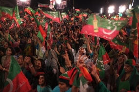 Supporters of Pakistan opposition leader Imran Khan attend a rally in Islamabad on Saturday